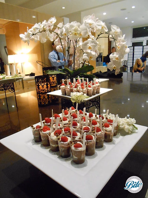 Dessert Display with Orchids Background