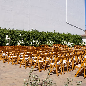 Wedding Ceremony Setup with Folding Chairs in the Plaza
