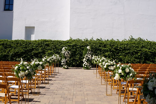 Wedding Ceremony Setup Against Passionfruit in Plaza