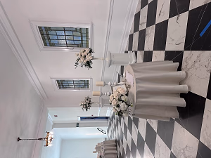 Wedding Floral and Guestbook in Foyer