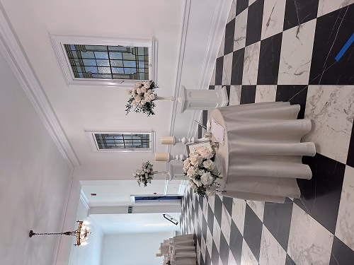 Wedding Floral and Guestbook in Foyer