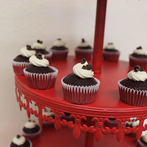 Chocolate cupcake on red riser