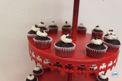 Chocolate cupcake on red riser