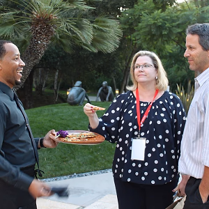 Company BBQ Server Serving Guests