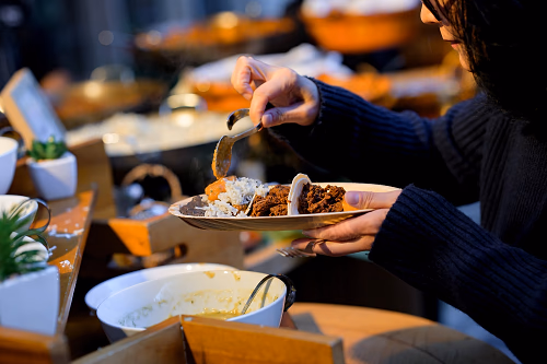 Guest Topping Taco and Tamales Plate