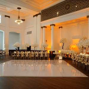 White-and-gold ballroom wedding setup